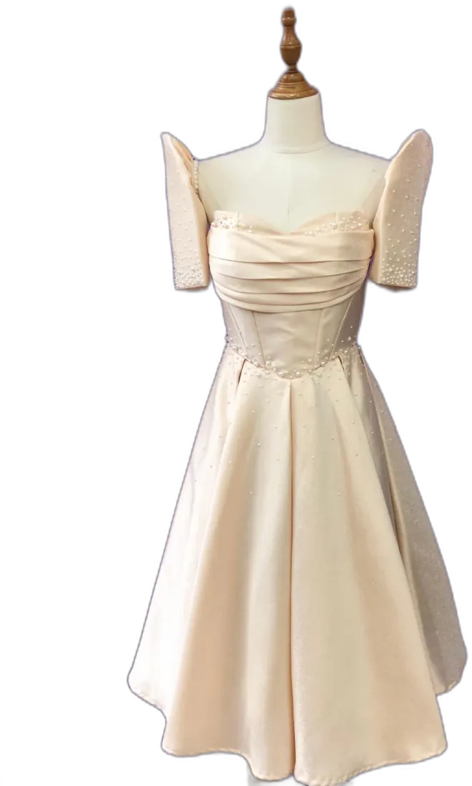 Cream satin dress with pleated bodice