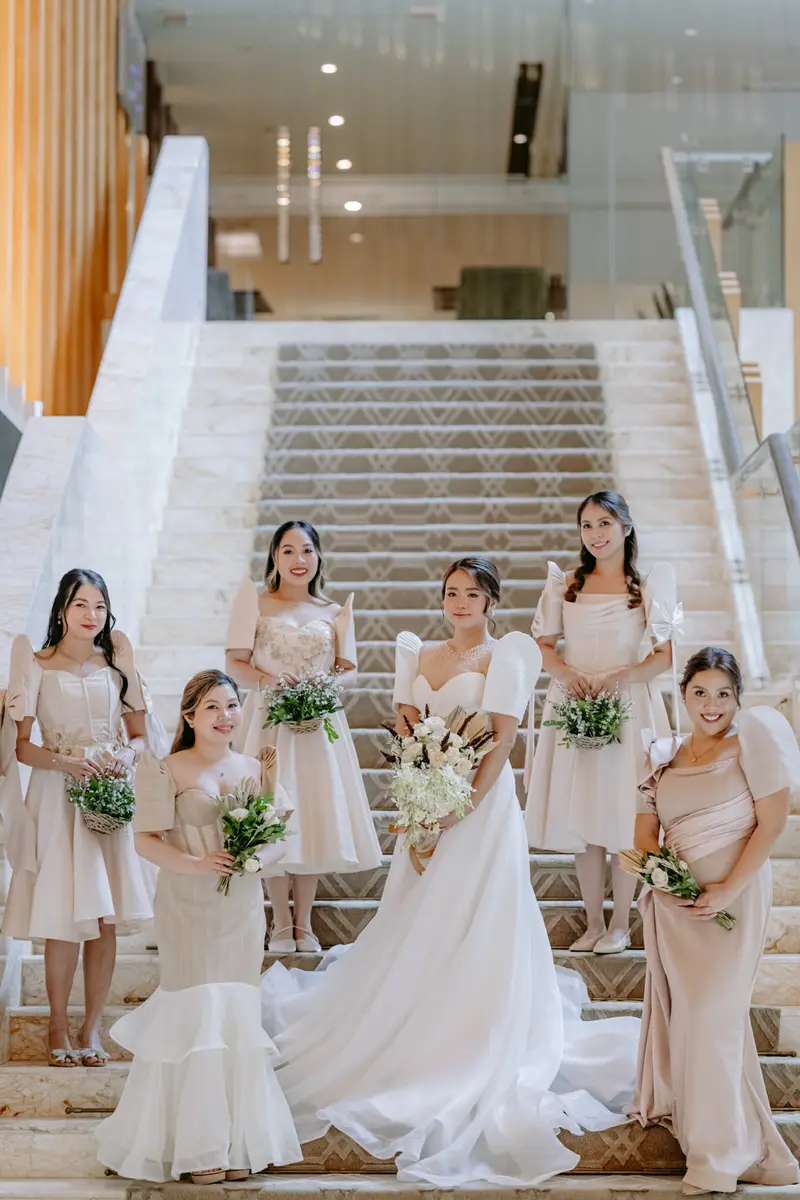Bride and entourage on a staircase