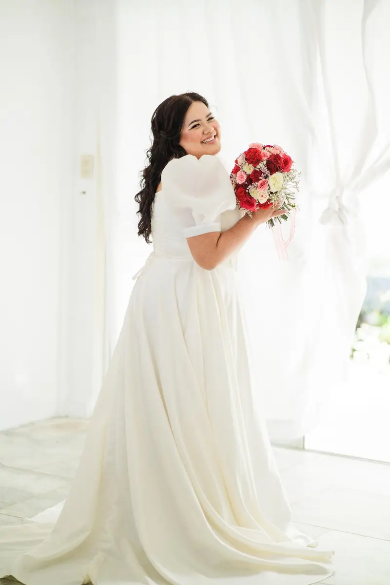 Bride with a red bouquet